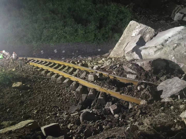 A section of the Chengdu-Kunming railway is devastated by a rock collapse in Ganluo County, Yi Autonomous Prefecture of Liangshan, Sichuan Province on August 15, 2019. [File photo: IC]