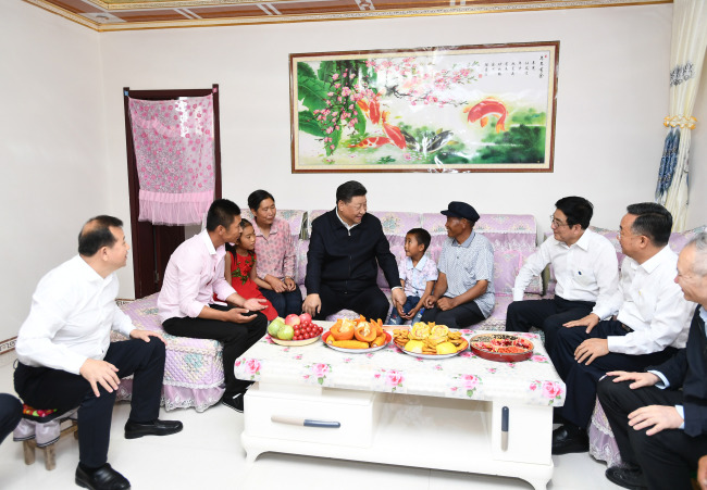 Chinese President Xi Jinping visits a new community in Fumin New Village of Gulang County, Wuwei City, Gansu Province, Aug. 21, 2019. [Photo: Xinhua/Xie Huanchi]