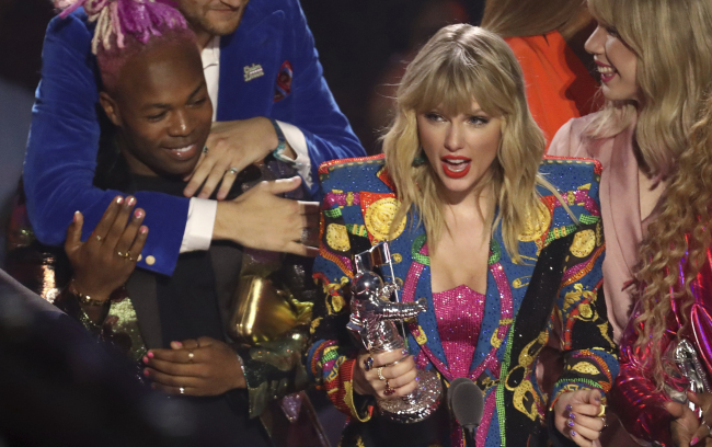 Taylor Swift accepts the video of the year award for "You Need to Calm Down" at the MTV Video Music Awards at the Prudential Center on Monday, Aug. 26, 2019, in Newark, N.J. [Photo: Matt Sayles/Invision/AP]