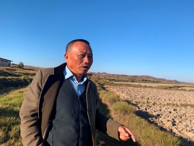 Agricultural expert Hu Yuefang with Yuan’s International Agricultural Development Co., Ltd. works to promote hybrid rice in Madagascar for over ten years. [Photo: China Plus/Gao Junya]