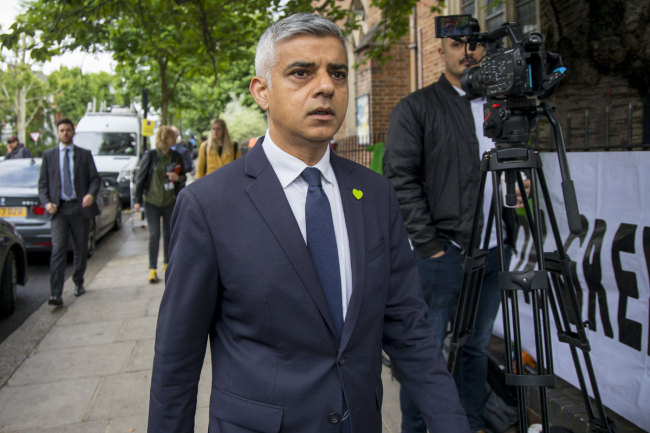 Mayor of London Sadiq Khan arrives for a service of remembrance for the Grenfell tower fire at St Helen's church in west London on June 14, 2019. [Photo: AFP]