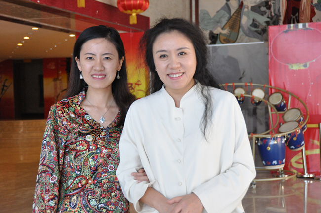 Jiang Ying(L), the composer and the director, Wang Chaoge. [Photo courtesy of CNTO]