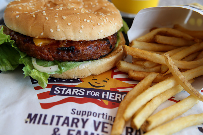 In this photo illustration, a Carl's Jr. Famous Star Beyond Meat burger is displayed at a Carl's Jr. restaurant on June 10, 2019 in San Francisco, California. [Photo: Justin Sullivan/Getty Images via VCG]