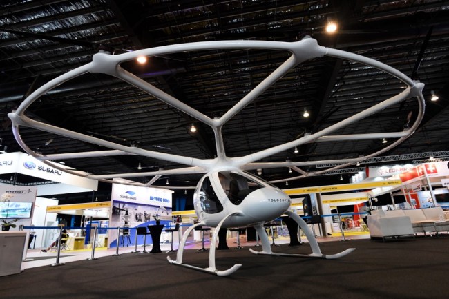A "flying taxi" Volocopter 2X is displayed during a media preview at Rotorcraft and Unmanned Systems exhibition in Singapore on April 8, 2019. [Photo: AFP/Roslan Rahman]
