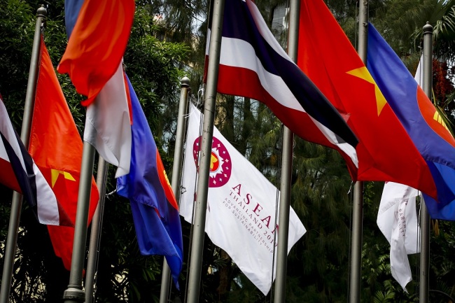 National flags from ASEAN member countries fly next to the ASEAN flag outside the venue for the 34th ASEAN Summit in Bangkok, Thailand, June 19, 2019. [File Photo: EPA via IC/DIEGO AZUBEL]