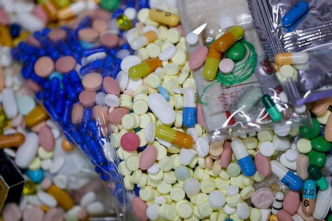 In this Sept. 11, 2019, file photo, medications slated for destruction are shown in a locked storage area of the police department in Barberton, Ohio. [Photo: AP]