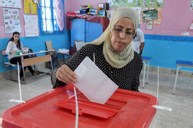 A Tunisian voter casts her ballot for presidential election at a polling station in La Marsa on the outskirts of the capital Tunis, on September 15, 2019. [Photo: AFP/Fethi Belaid]