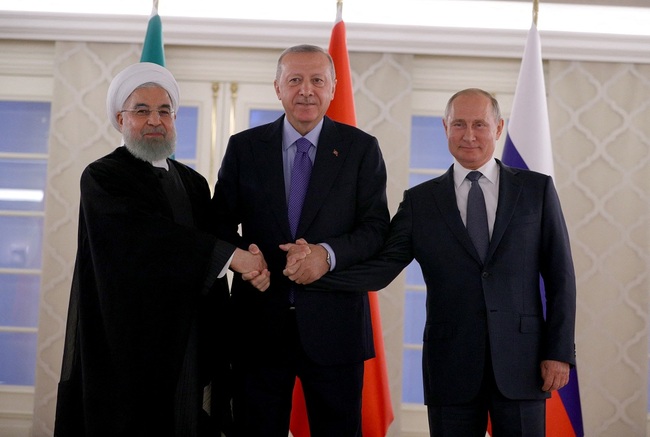 Iran's Prsident Hassan Rouhani (left), Turkish President Recep Tayyip Erdogan (center) and Russia's President Vladimir Putin (right) pose for photographers in Ankara, Turkey, September 16, 2019. [Photo: IC]