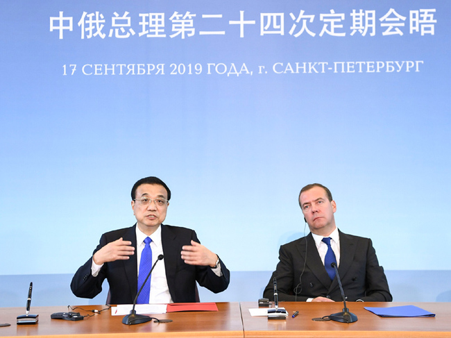 Chinese Premier Li Keqiang (L) and his Russian counterpart Dmitry Medvedev Jointly meet the press in St. Petersburg, Russia on Tuesday, September 17, 2019. [Photo: Xinhua]