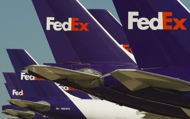 Federal Express cargo jets are lined up at the Memphis, Tennessee, headquarters World Hub, where aircraft wait to be loaded with packages and documents. [File photo: AFP/Paul J. Richards]