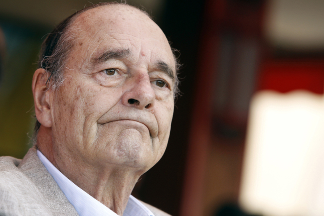 In this file photo taken on August 14, 2011 France's former President Jacques Chirac sits at a table outside the famous Le Senequier cafe in the French Riviera searesort of Saint-Tropez. [File Photo: AFP/Sebastien Nogier]