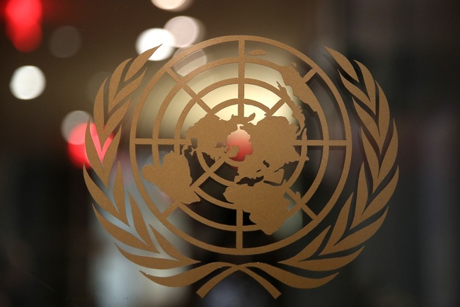 The UN logo on a door at the Headquarters of the United Nations ahead of the 74th Session of the UN General Assembly, New York, USA, September 23, 2019. [Photo: IC/TASS/Valery Sharifulin]