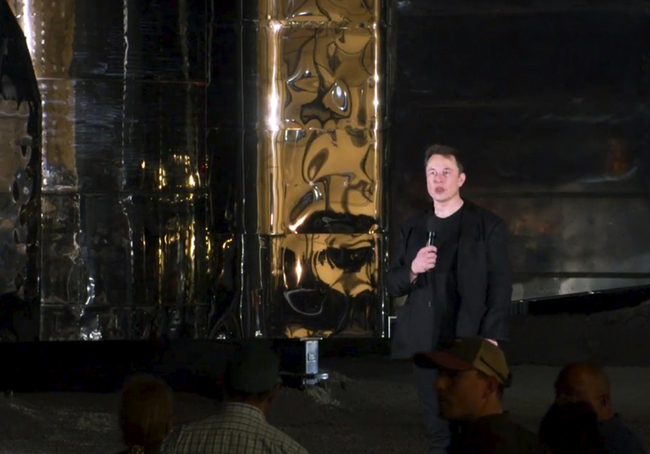 In this image made from video provided by SpaceX, Elon Musk speaks of SpaceX's newly designed aircraft at its launch facility near Brownsville, Texas, Saturday, Sept. 28, 2019. [Photo: SpaceX via AP]