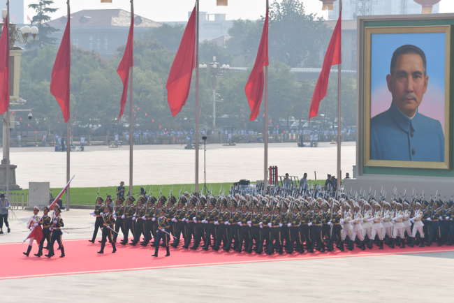 A national flag-raising ceremony is held during a grand rally on October 1, 2019, at Tian'anmen Square in downtown Beijing to celebrate the 70th anniversary of the founding of the People's Republic of China (PRC). [Photo: IC]