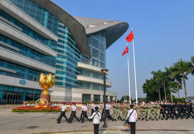 A national flag raising ceremony is held at the Golden Bauhinia Square to celebrate the 70th anniversary of the founding of PRC at 8 a.m. in Hong Kong Special Administrative Region, on October 1, 2019. [Photo: IC]