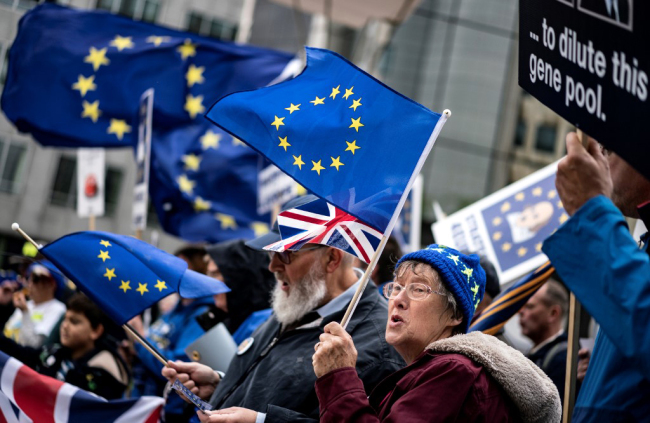 Anti-Brexit activists protest near the European Parliament in Brussels on October 9, 2019. [Photo: AFP/Kenzo Tribouillard]