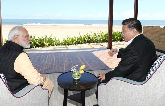 Chinese President Xi Jinping and Indian Prime Minister Narendra Modi continue their informal meeting in Chennai, India, Oct. 12, 2019. [Photo: Xinhua/Ju Peng]