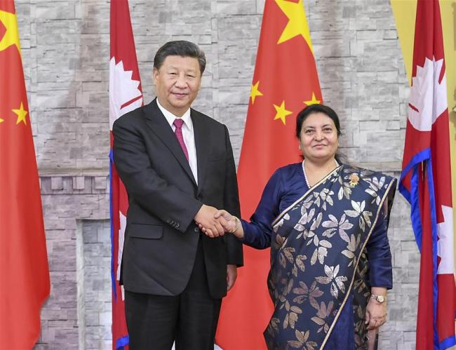 Chinese President Xi Jinping meets with Nepali President Bidya Devi Bhandari in Kathmandu, Nepal, Oct. 12, 2019. [Photo: Xinhua/Xie Huanchi]