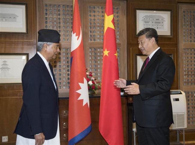 Chinese President Xi Jinping meets with President of the Nepali Congress Party Sher Bahadur Deuba in Kathmandu, Nepal, Oct. 12, 2019. [Photo: Xinhua/Li Xueren]
