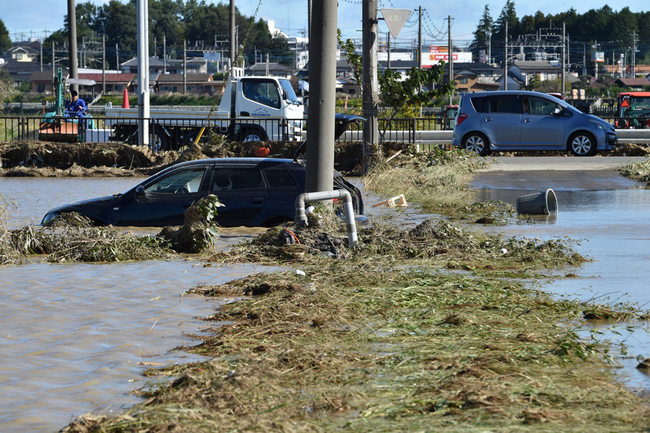 A car sits in a flooded field in Higashi-matsuyama, Saitama prefecture on October 13, 2019, after Typhoon Hagibis swept through central and eastern Japan. [Photo: AFP/Kazuhiro Nogi]