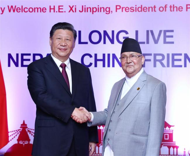 Chinese President Xi Jinping holds talks with Nepali Prime Minister K.P. Sharma Oli in Kathmandu, Nepal, Oct. 13, 2019. [Photo: Xinhua/Ju Peng]