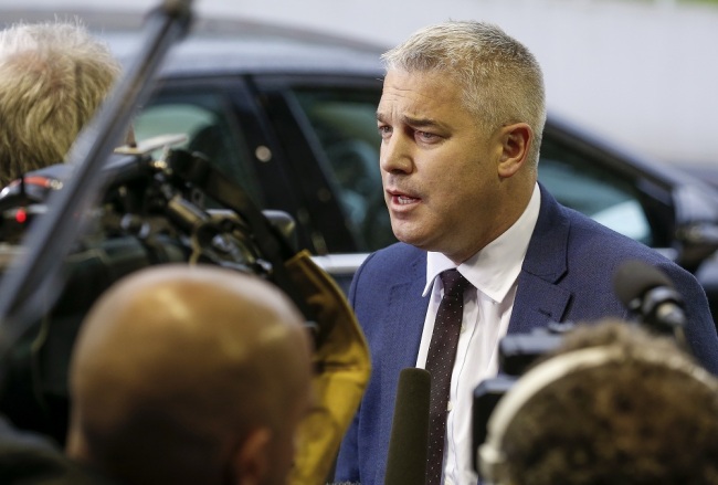 Britain's Brexit Secretary Stephen Barclay speaks to members of the media as he arrives to attend the General Affairs Council on Article 50, in Luxembourg, October 15, 2019. [Photo: IC]