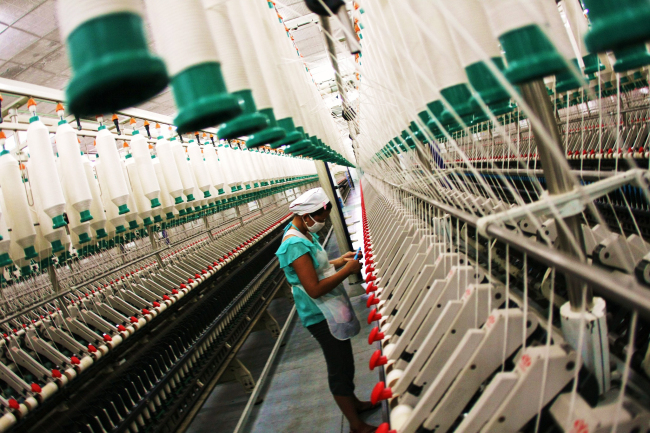 A spinning factory in Nantong, Jiangsu Province, on August 24, 2009. [File Photo: VCG]