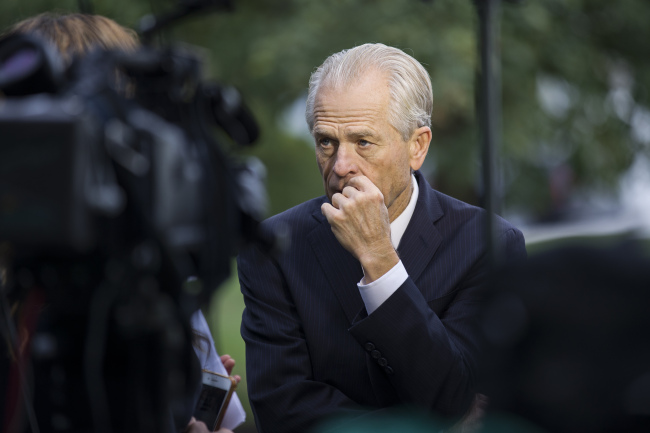 White House trade adviser Peter Navarro pauses while speaking after a television interview at the White House, Tuesday, Oct. 8, 2019, in Washington. [Photo: AP/IC]