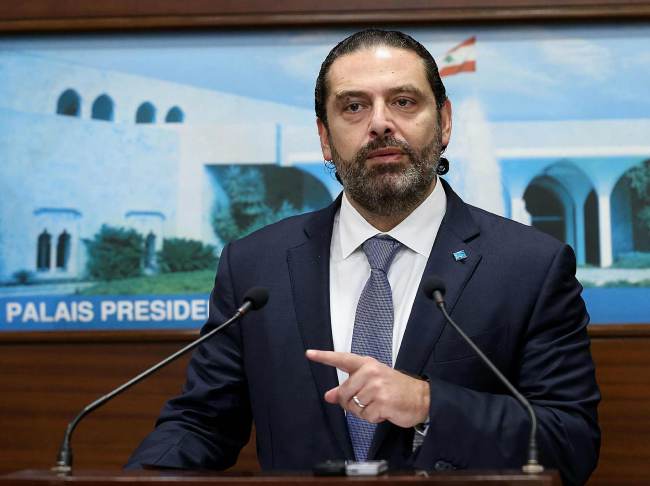 A handout picture shows Lebanon's Prime Minister Saad Hariri speaking to the press following a cabinet meeting at the presidential palace in Baabda, on October 21, 2019. [Photo: STRINGER/DALATI AND NOHRA/AFP]