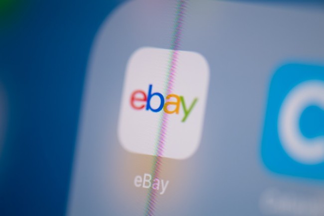This illustration picture taken on July 24, 2019 in Paris shows the logo of the US web auctions application eBay on the screen of a tablet. [Photo: AFP]