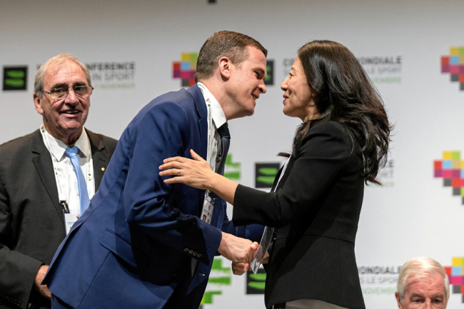 Witold Banka greets Yang Yang during the Fifth World Conference on Doping in Sport WADA2019 in Katowice, Poland, November 5, 2019. [Photo: VCG]