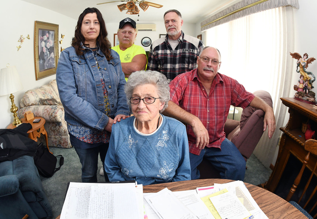 In this undated photo, Edna Schmeets, 90, poses for a picture with her children, from left, Lisa Appelt, and Ron, Tim and Jeff Schmeets, at her home in Harvey, N.D. [Photo: AP]