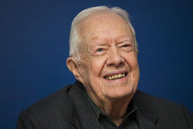 In this file photo Former U.S. President Jimmy Carter smiles during a book signing event for his new book 'Faith: A Journey For All' at Barnes & Noble bookstore in Midtown Manhattan, March 26, 2018 in New York City. [File photo: Getty Images North America/AFP/Drew Angerer]