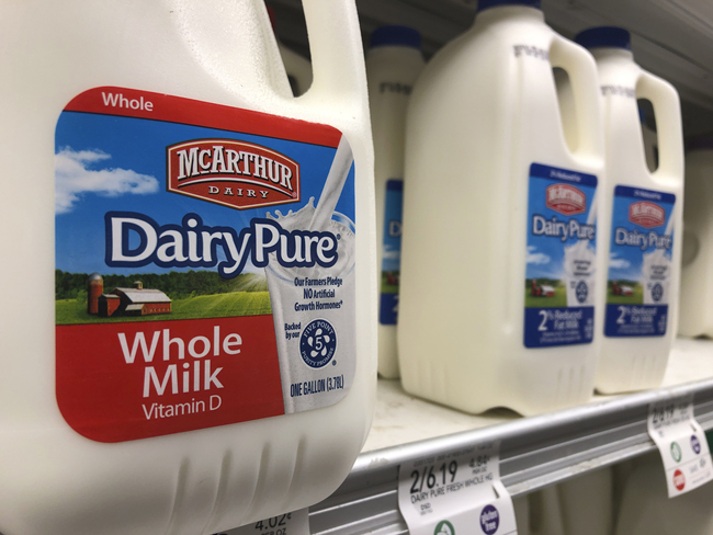 Jugs of McArthur Dairy milk, a Dean Foods brand, are shown at a grocery store, Tuesday, Nov. 12, 2019, in Surfside, Florida. [Photo: AP/Wilfredo Le]