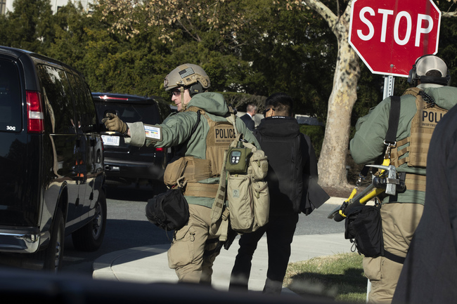 Members of the U.S. Secret Service' Hazardous Agent Mitigation and Medical Emergency Response (HAMMER) Team, move from their vehicle as President Donald Trump is visiting Walter Reed National Military Medical Center, Saturday, Nov. 16, 2019, in Bethesda, Md. [Photo: AP/Manuel Balce Ceneta]