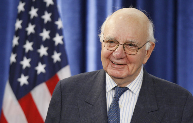 In this Nov. 26, 2008, file photo former Federal Reserve Chairman Paul Volcker, chairman-designate of the Economic Recovery Advisory Board, listens to President-elect Barack Obama, not pictured, as he speaks during a news conference in Chicago. Volcker, the former Federal Reserve chairman died on Sunday, Dec. 8, 2019, according to his office, He was 92. [File Photo: AP]