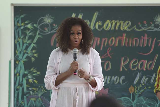 Former U.S. first lady Michelle Obama speaks to female students at Can Giuoc high school in Long An province, Vietnam Monday, Dec. 9, 2019. Obama is on a visit to Vietnam to promote education for adolescent girls. [Photo: AP]