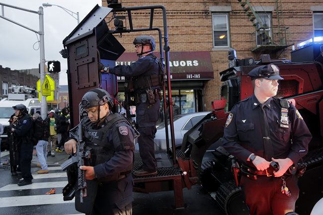 Emergency responders move heavy equipment near the scene of a shooting in Jersey City, N.J., Tuesday, Dec. 10, 2019. [Photo: AP /Seth Wenig]