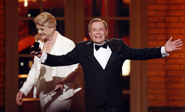 In this June 7, 2009, file photo, Jerry Herman accepts his Special Tony Award for Lifetime Achievement in the Theater from Angela Lansbury at the 63rd Annual Tony Awards in New York. [Photo: AP/Seth Wenig]