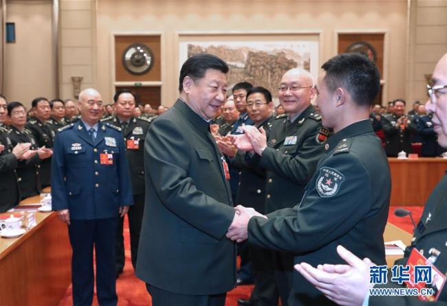 (Dos sesiones) Xi subraya profundización de integración militar-civil para sueño chino