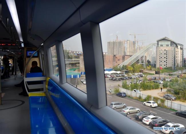 Essai de la première ligne de métro à sustentation magnétique de Beijing