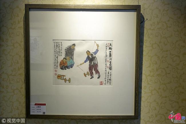 Une exposition sur les coutumes pékinoises dans une ancienne tour de guet à Beijing