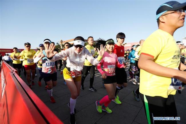  Des participants lors du semi-marathon de Beijing, capitale de la Chine, le 14 avril 2019. (Photo : Wang Lili)