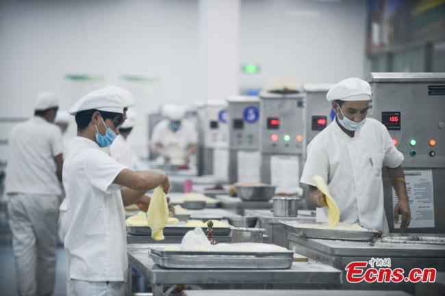 Xinjiang : la spécialité culinaire « Nang » stimule le développement