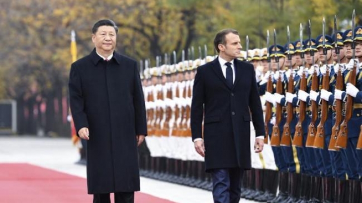 Xi Jinping dialóga com Macron em Beijing