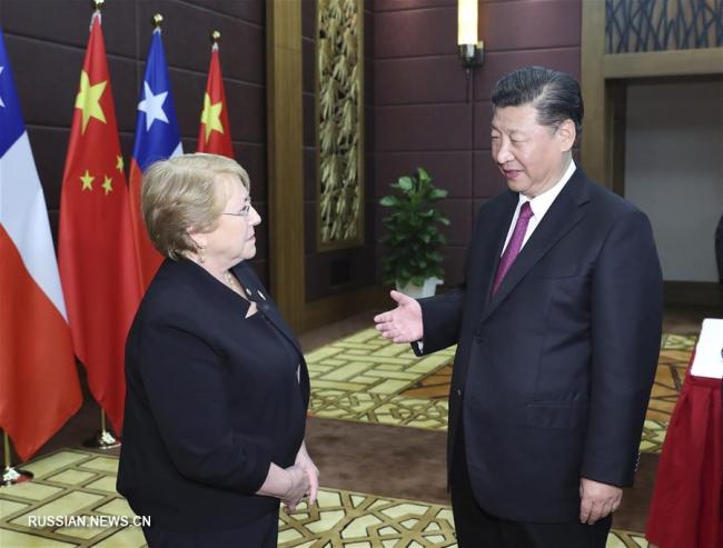 Си Цзиньпин и президент Чили М.Бачелет присутствовали на церемонии подписания протокола о повышении уровня соглашения о свободной торговле