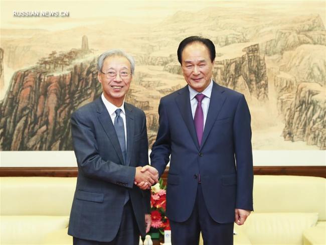 Генеральный директор Синьхуа Цай Минчжао встретился с генеральным директором Киодо Цусин