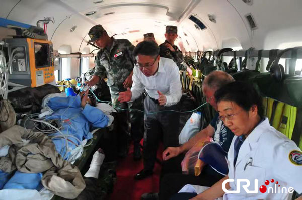 Unang pangkat ng mga nasugatang Tsino sa aksidente ng bus sa Laos, bumalik