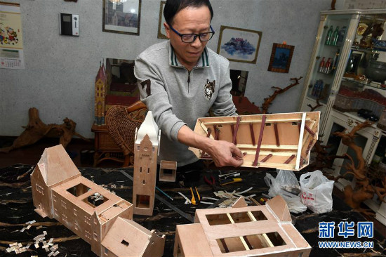 Modelo ng mga katangi-tanging gusali sa Qingdao na gamit ang kabibi